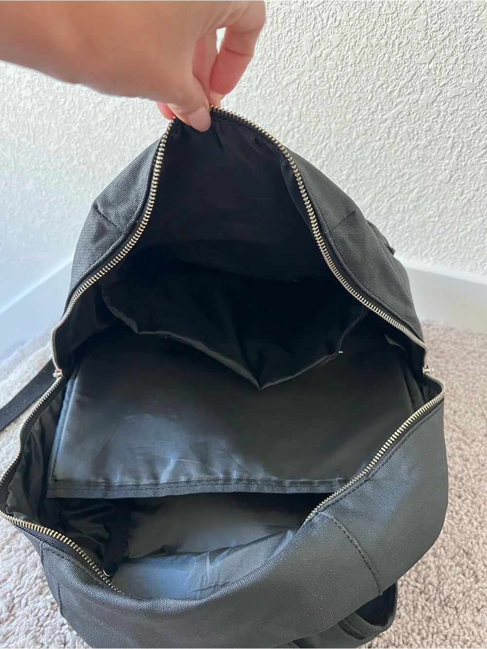Black diaper backpack by The Honest Company